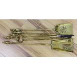 Brass five piece fire companion set, the largest 70cm in length