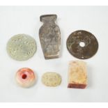 A collection of Chinese jade and hardstone items in an Imari dish