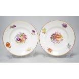 A pair of 19th century Derby floral small plates with gilded decoration, probably painted by