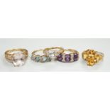 Five assorted modern 9ct gold and gem set dress rings, including citrine and diamond and amethyst