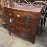 A small Regency banded and inlaid mahogany bow fronted chest of drawers, width 74cm, depth 45cm,