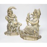 A pair of cast brass Punch and Judy door stops, the largest 28cm high