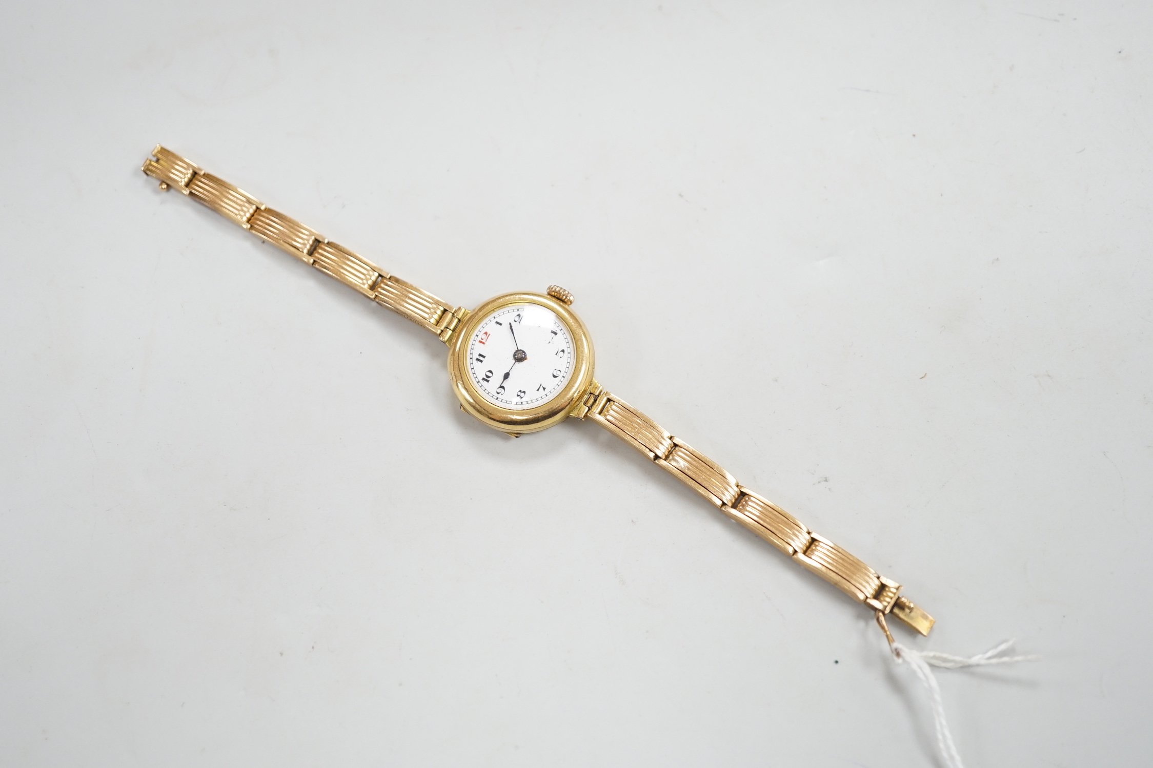 An early 20th century 18ct gold manual wind wrist watch, on an 18ct flexible bracelet, case diameter - Image 4 of 4