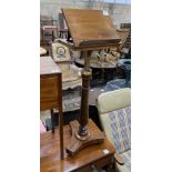 A Victorian style brass mounted mahogany adjustable reading table