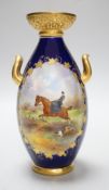 A Grainger & Co. Worcester two handled vase painted with a fox hunting scene in a raised gilt
