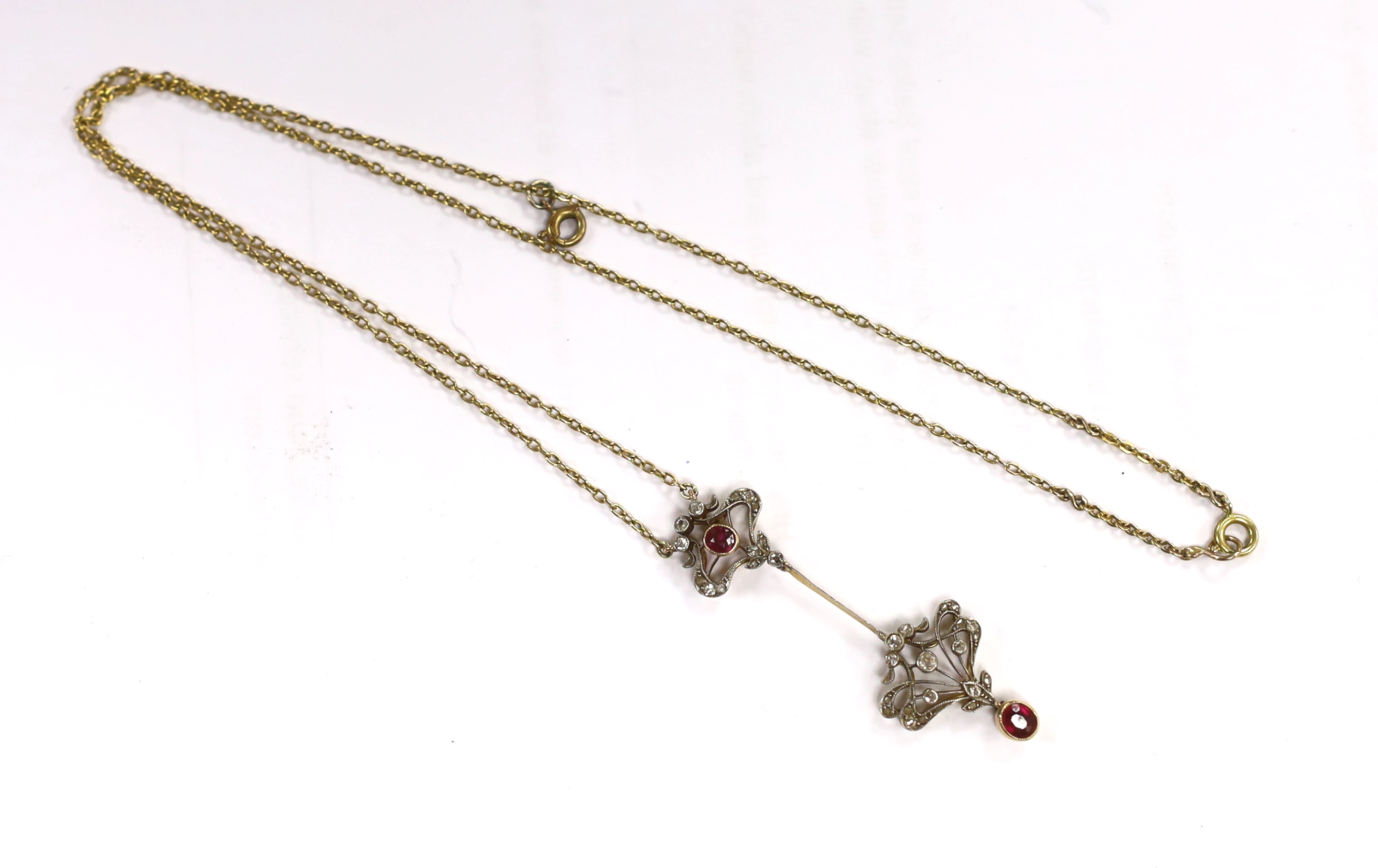 A Belle Epoque yellow metal and millegrain set ruby and diamond drop pendant necklace, the chain - Image 2 of 3
