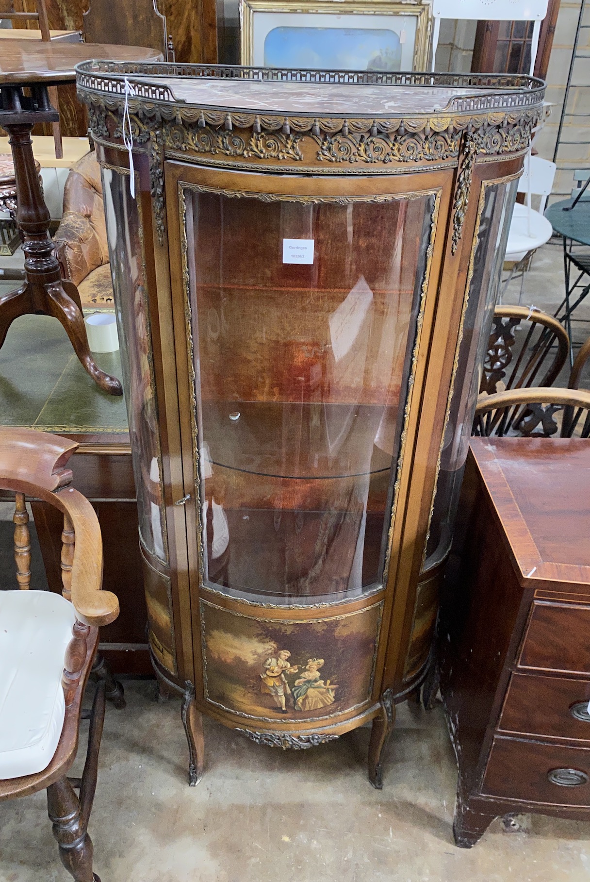 A Louis XV style ormolu mounted marble topped mahogany vitrine, with Vernis Martin style panels,