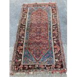 An antique North West Persian Baidjar red ground rug, 191 x 108cm
