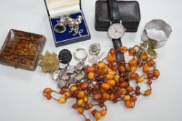 A small collection of costume jewellery, including silver pendants, amber necklace etc, together