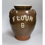 An early 20th century pottery jar inscribed ‘Flour B’, 30cm high