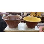 Two Victorian glazed earthenware circular dairy bowls, larger diameter 50cm, height 27cm