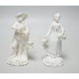 A pair of 18th century Derby biscuit figures of a man and woman, he with a bunch of grapes and she