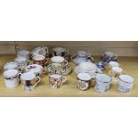 A collection of 18th and 19th century English and continental tea and coffee cups some with saucers,