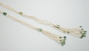 A 19th century Indian multi strand seed pearl and emerald? set long necklace, with gem set tassel