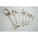 A collection of George III and later silver flatware including a sauce ladle, six Old English