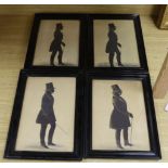 Victorian School, four cut and bronzed paper silhouettes, Full length profiles of gentlemen