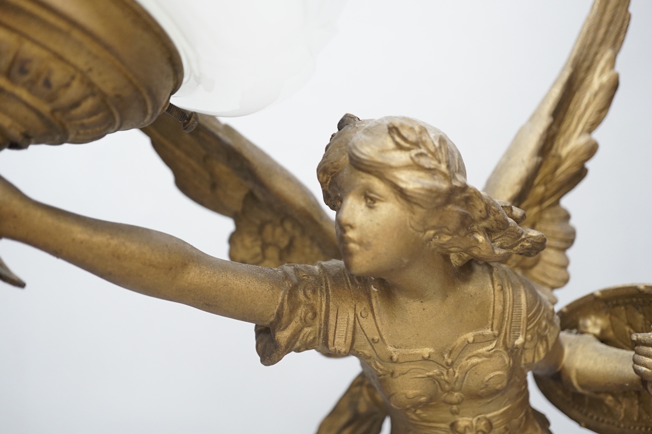 A gilt spelter Victory figural lamp with opaque glass shade, raised on a square base, 54cm high - Image 2 of 3