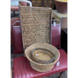 A rectangular African woven hardwood tray, two sieves and a woven bowl