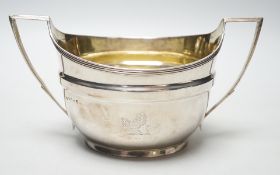 A George III silver two handled oval sugar bowl, John Emes, London, 1802, length 19.2cm over