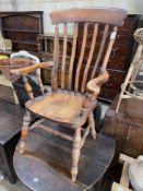 A Victorian style elm and beech Windsor lathe back armchair, width 68cm, depth 49cm, height 116cm