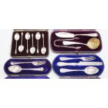 Four cased sets of silver cutlery including apostle spoons and christening sets.