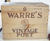 12 bottles of Warres Vintage Poet, 1983, in OWC.