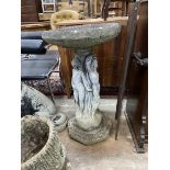 A reconstituted stone circular 'The Three Graces' bird bath, diameter 48cm, height 84cm