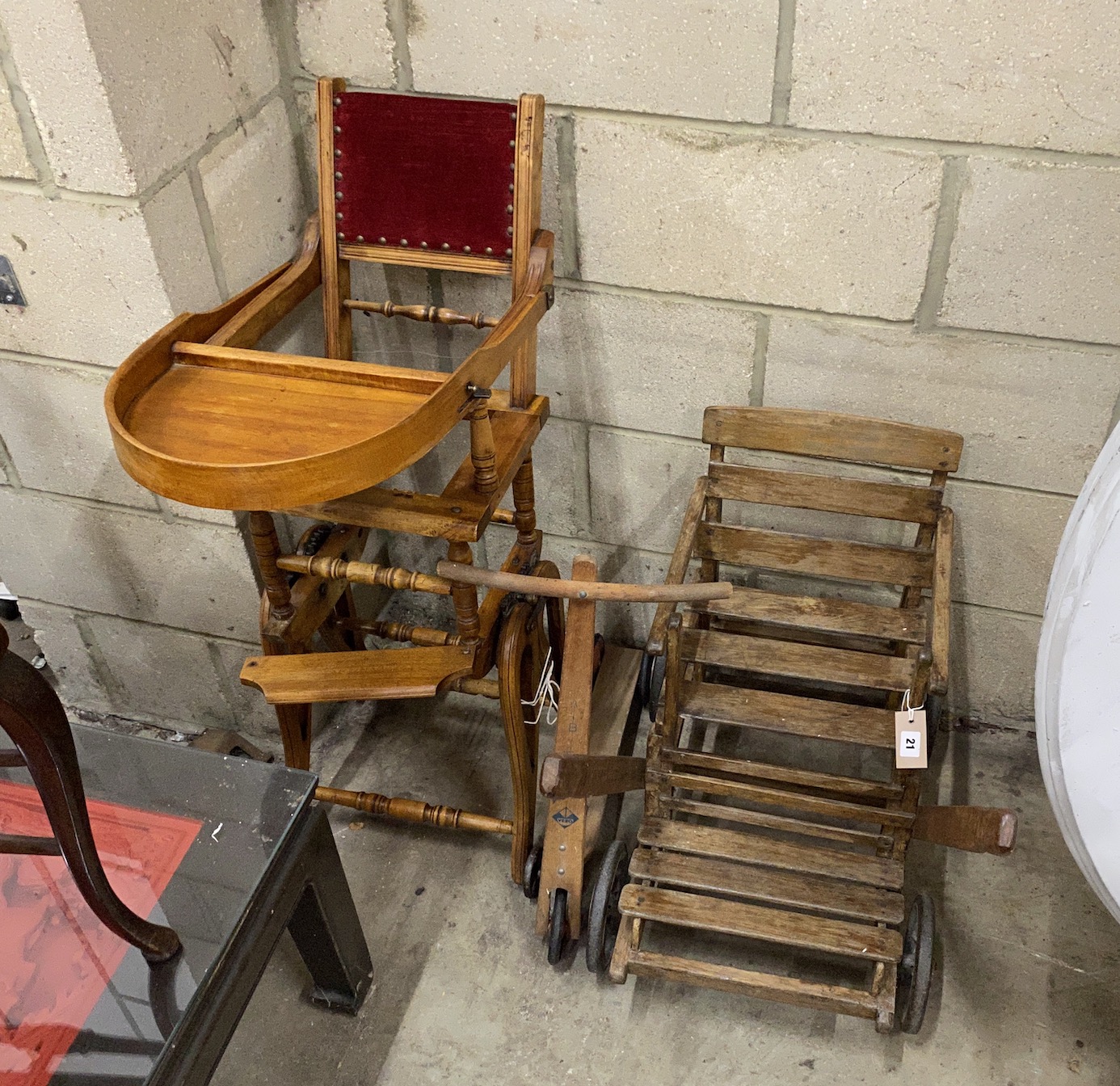 An early 20th century French pull along child's chair, a metamorphic child's chair and a scooter