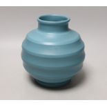 Keith Murray for Wedgwood - a blue glazed ribbed globular vase, 19cm high