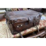 A Victorian leather brass and copper studded travelling trunk, width 89cm, depth 53cm, height 37cm
