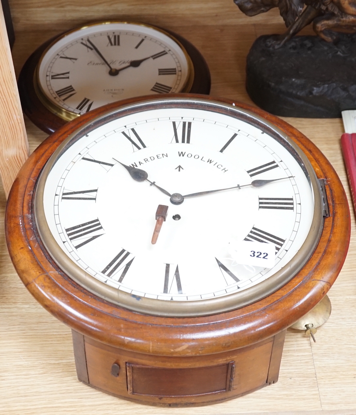 An Edwardian mahogany single fusee wall timepiece, The dial signed Warden Woolwich, the movement