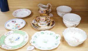 A collection of early 19th century decorative porcelain painted with flowers and a gilt blue