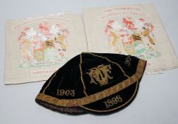 Two South African late 19th century damask railway napkins and a velvet rugby or cricketing cap