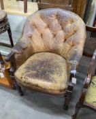 An early Victorian buttoned brown leather mahogany library chair, width 68cm, depth 54cm, height