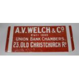 An enamel advertising sign: A.V. Welch & Co Established 1893 sign