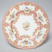 A Coalport plate painted with pink ground border, having alternating bird and flower panels and