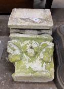 A pair of stone capitals, width 26cm, depth 18cm, height 24cm