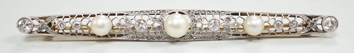 A Belle Epoque pierced yellow and white metal, cultured? pearl and diamond set bar brooch, 84mm,