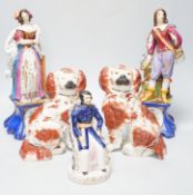 A pair of late 19th century French porcelain figures of cavalier and a maiden, a late pottery figure
