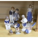 Eight items of mixed Royal Copenhagen and Bing & Grondahl, including figure groups birds and