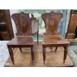 A pair of Victorian mahogany hall chairs, width 42cm, height 88cm