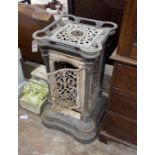 A 19th century French enamelled cast iron conservatory heater, lacking burner, width 44cm, height