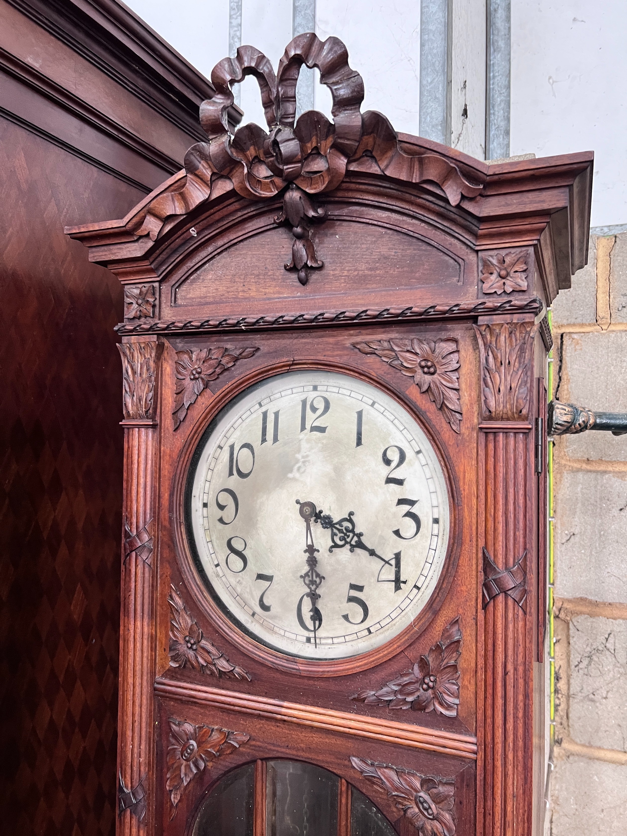 An early 20th century French carved walnut thirty hour longcase clock, height 224cm