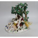 A large 19th century Meissen group of two lovers beneath a tree, incised model no. 485, blue crossed