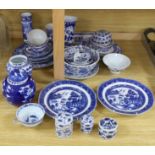 A collection of Chinese and Japanese blue and white jars, export plates and pots,, together with