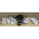 A collection of Regency stoneware and porcelain tea wares, including a small collection of black