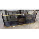 A Victorian brass tipped wire mesh fender, length 104cm together with a brass coal scuttle