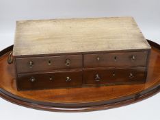 A small Georgian mahogany collector's chest and an Edwardian inlaid mahogany tray, the largest