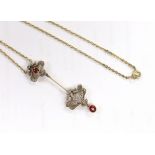 A Belle Epoque yellow metal and millegrain set ruby and diamond drop pendant necklace, the chain