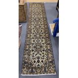 A North West Persian ivory ground runner, 400 x90cm